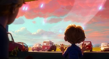 Movie still from “The Mitchells vs the Machines” (2021), directed by Jeff Rowe – A child looking out a window at a bunch of cars; Wide shot, Over the shoulder angle