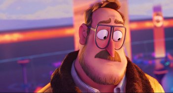Movie still from “The Mitchells vs the Machines” (2021), directed by Jeff Rowe – An image of an animated man with a beard and glasses; Close Up shot, Over the shoulder angle