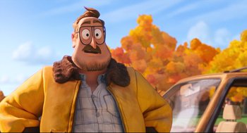 Movie still from “The Mitchells vs the Machines” (2021), directed by Jeff Rowe – An animated man with a beard wearing a yellow jacket; Close Up shot, Over the shoulder angle