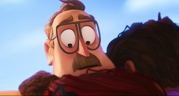 Movie still from “The Mitchells vs the Machines” (2021), directed by Jeff Rowe – An animated man with a beard and glasses; Close Up shot, Over the shoulder angle