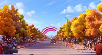 Movie still from “The Mitchells vs the Machines” (2021), directed by Jeff Rowe – A car driving down a street under a rainbow in the sky; Extreme Wide shot, Low angle