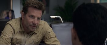 Movie still from “The Mule” (2018), directed by Clint Eastwood – A person sitting at a table; Close Up shot, Over the shoulder angle