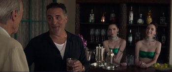 Movie still from “The Mule” (2018), directed by Clint Eastwood – A man and a woman sitting at a bar; Medium shot, Over the shoulder angle