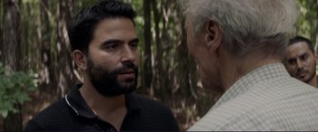 Movie still from “The Mule” (2018), directed by Clint Eastwood – A man with a beard talking to an older man; Close Up shot, Over the shoulder angle