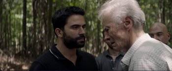 Movie still from “The Mule” (2018), directed by Clint Eastwood – A man with a beard talking to an older man; Close Up shot, Over the shoulder angle