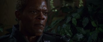 Movie still from “The Negotiator” (1998), directed by F. Gary Gray – A man's face in the dark; Close Up shot, Low angle