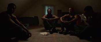 Movie still from “Burning Sands” (2017), directed by Gerard McMurray – Medium shot, Low angle