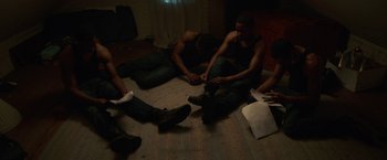 Movie still from “Burning Sands” (2017), directed by Gerard McMurray – Medium shot, High angle