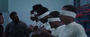 Movie still from “Burning Sands” (2017), directed by Gerard McMurray – Medium shot, High angle