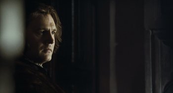 Movie still from “The Other Boleyn Girl” (2008), directed by Justin Chadwick – A person in a dark room; Close Up shot, Low angle