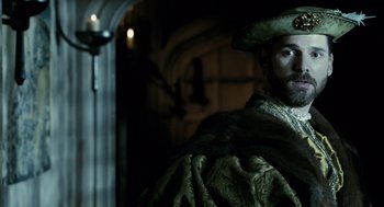 Movie still from “The Other Boleyn Girl” (2008), directed by Justin Chadwick – A person wearing a hat; Medium shot, Over the shoulder angle
