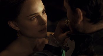 Movie still from “The Other Boleyn Girl” (2008), directed by Justin Chadwick – A person putting a ring on a finger of another person; Close Up shot, Over the shoulder angle