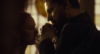 Movie still from “The Other Boleyn Girl” (2008), directed by Justin Chadwick – A man and a woman holding hands in a room; Close Up shot, Over the shoulder angle