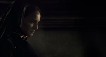 Movie still from “The Other Boleyn Girl” (2008), directed by Justin Chadwick – A man in a dark room looking to his left; Close Up shot, Over the shoulder angle