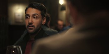 Movie still from “The Ritual” (2017), directed by David Bruckner – A person looking at a camera; Close Up shot, Over the shoulder angle