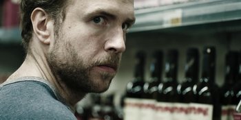 Movie still from “The Ritual” (2017), directed by David Bruckner – A person with a beard; Close Up shot, Over the shoulder angle