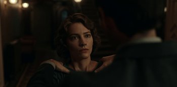 Movie still from “Guillermo del Toro's Cabinet of Curiosities” (2022), directed by Keith Thomas – A beautiful woman sitting in front of a mirror; Close Up shot, Over the shoulder angle