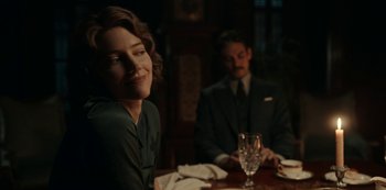 Movie still from “Guillermo del Toro's Cabinet of Curiosities” (2022), directed by Keith Thomas – A man and a woman sitting at a dinner table; Close Up shot, Over the shoulder angle