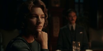 Movie still from “Guillermo del Toro's Cabinet of Curiosities” (2022), directed by Keith Thomas – A man and a woman sitting at a dinner table; Close Up shot, Over the shoulder angle