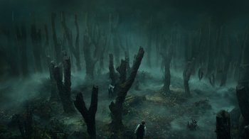 Movie still from “Guillermo del Toro's Cabinet of Curiosities” (2022), directed by Keith Thomas – A forest with trees and fog in the background; Extreme Wide shot, High angle
