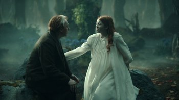 Movie still from “Guillermo del Toro's Cabinet of Curiosities” (2022), directed by Keith Thomas – A man and a woman in a white dress; Medium shot, Over the shoulder angle
