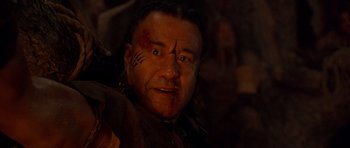 Movie still from “The Scorpion King” (2002), directed by Chuck Russell – A person with makeup on his face; Close Up shot, Low angle