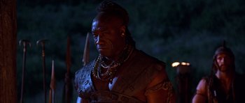 Movie still from “The Scorpion King” (2002), directed by Chuck Russell – A person wearing a costume; Close Up shot, Low angle