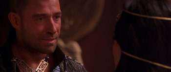 Movie still from “The Scorpion King” (2002), directed by Chuck Russell – A person with a beard; Close Up shot, Over the shoulder angle