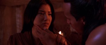 Movie still from “The Scorpion King” (2002), directed by Chuck Russell – A man touching a woman's face with her hand; Close Up shot, Over the shoulder angle