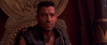 Movie still from “The Scorpion King” (2002), directed by Chuck Russell – A person wearing a jacket; Close Up shot, Over the shoulder angle