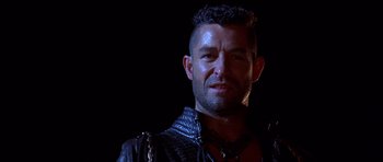 Movie still from “The Scorpion King” (2002), directed by Chuck Russell – A person wearing a leather jacket; Close Up shot, Low angle