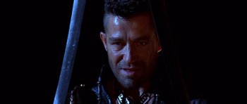 Movie still from “The Scorpion King” (2002), directed by Chuck Russell – A person with a sword; Close Up shot, Low angle