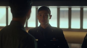 Movie still from “The Silent Sea” (2021), created by Choi Hang-Yong – A man in a military uniform talking to another man; Close Up shot, Over the shoulder angle
