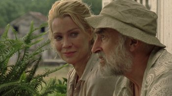 Movie still from “The Walking Dead” (2010), directed by Daniel Sackheim – A man and a woman sitting next to each other; Close Up shot, Over the shoulder angle