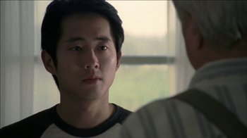 Movie still from “The Walking Dead” (2010), directed by Daniel Sackheim – A young man is looking at a older man; Close Up shot, Over the shoulder angle