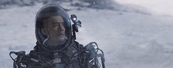 Movie still from “The Wandering Earth” (2019), directed by Frant Gwo – A person wearing a space suit; Medium shot, Low angle
