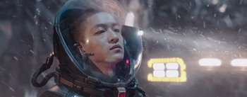 Movie still from “The Wandering Earth” (2019), directed by Frant Gwo – A man in a space suit is looking into the distance; Close Up shot, Low angle