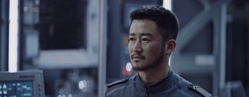 Movie still from “The Wandering Earth” (2019), directed by Frant Gwo – A person wearing a jacket; Close Up shot, Over the shoulder angle