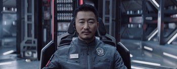 Movie still from “The Wandering Earth” (2019), directed by Frant Gwo – A person wearing a helmet; Close Up shot, High angle