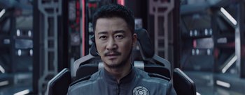 Movie still from “The Wandering Earth” (2019), directed by Frant Gwo – A person wearing a helmet; Close Up shot, Over the shoulder angle