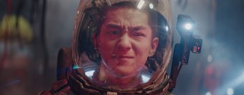 Movie still from “The Wandering Earth” (2019), directed by Frant Gwo – A person in a space suit is reflected in a mirror; Close Up shot, Low angle
