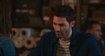 Movie still from “Can You Keep a Secret?” (2019), directed by Elise Durán – A person wearing a jacket; Close Up shot, Over the shoulder angle