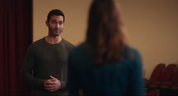 Movie still from “Can You Keep a Secret?” (2019), directed by Elise Durán – A man and a woman standing in front of each other; Medium shot, Over the shoulder angle