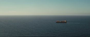 Movie still from “Captain Phillips” (2013), directed by Paul Greengrass – A large boat in the middle of the ocean; Extreme Wide shot, High angle