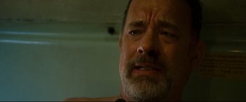 Movie still from “Captain Phillips” (2013), directed by Paul Greengrass – A person with a beard; Close Up shot, Low angle
