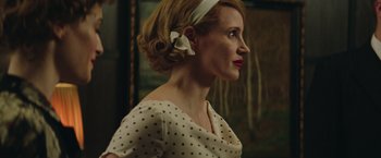 Movie still from “The Zookeeper's Wife” (2017), directed by Niki Caro – A person wearing a dress; Close Up shot, Low angle