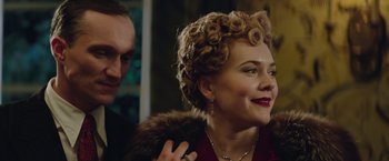 Movie still from “The Zookeeper's Wife” (2017), directed by Niki Caro – A man and a woman are looking at one another; Close Up shot, Low angle