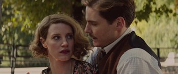 Movie still from “The Zookeeper's Wife” (2017), directed by Niki Caro – A man and a woman standing next to each other; Close Up shot, Low angle