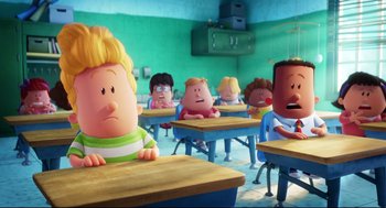 Movie still from “Captain Underpants: The First Epic Movie” (2017), directed by David Soren – A group of cartoon characters in a classroom; Medium shot, Over the shoulder angle