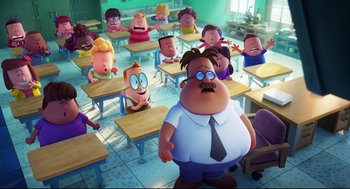 Movie still from “Captain Underpants: The First Epic Movie” (2017), directed by David Soren – A group of people sitting in a classroom with a teacher; Extreme Wide shot, High angle